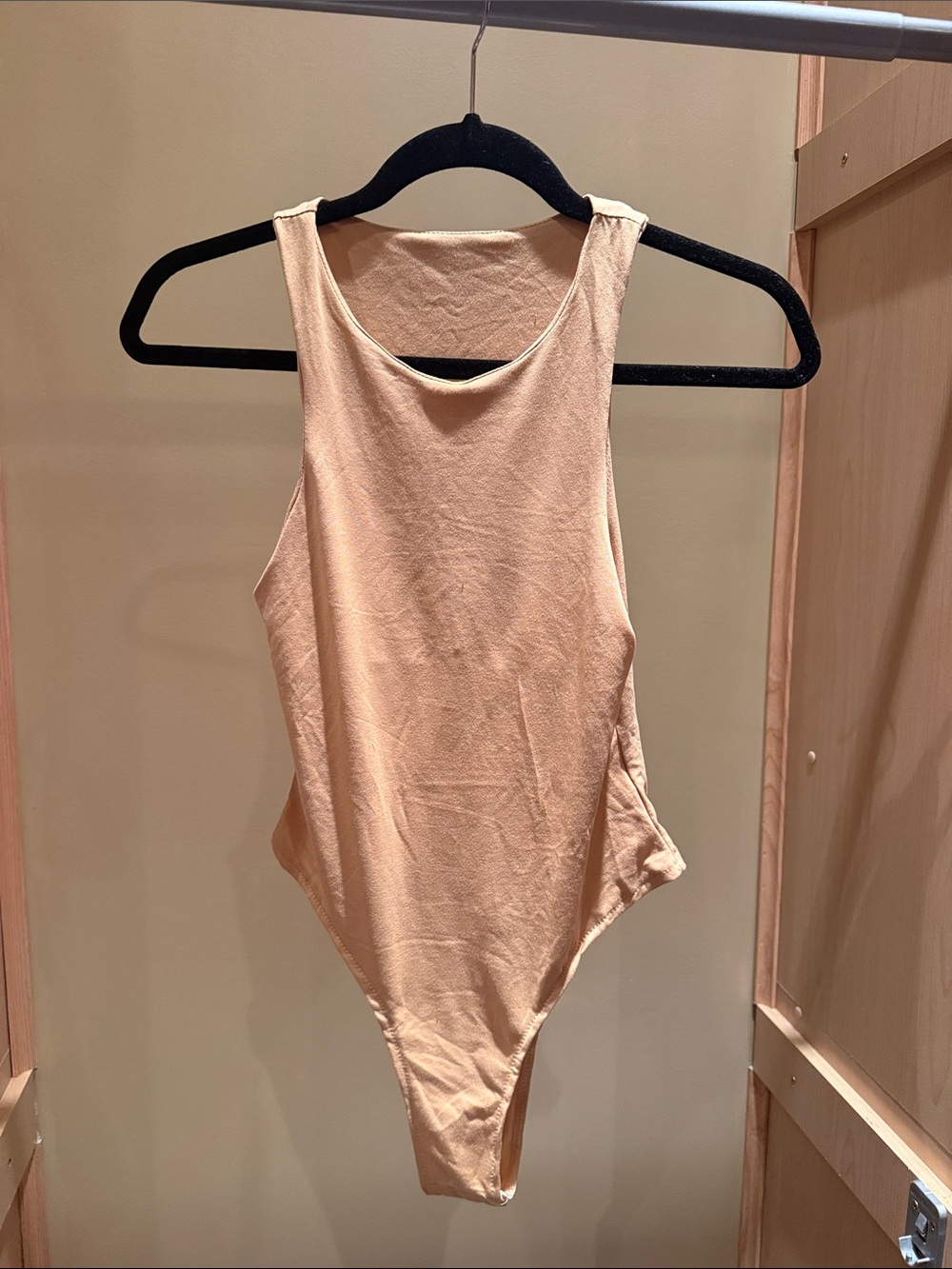 Sleeveless High-Neck Bodysuit in Nude